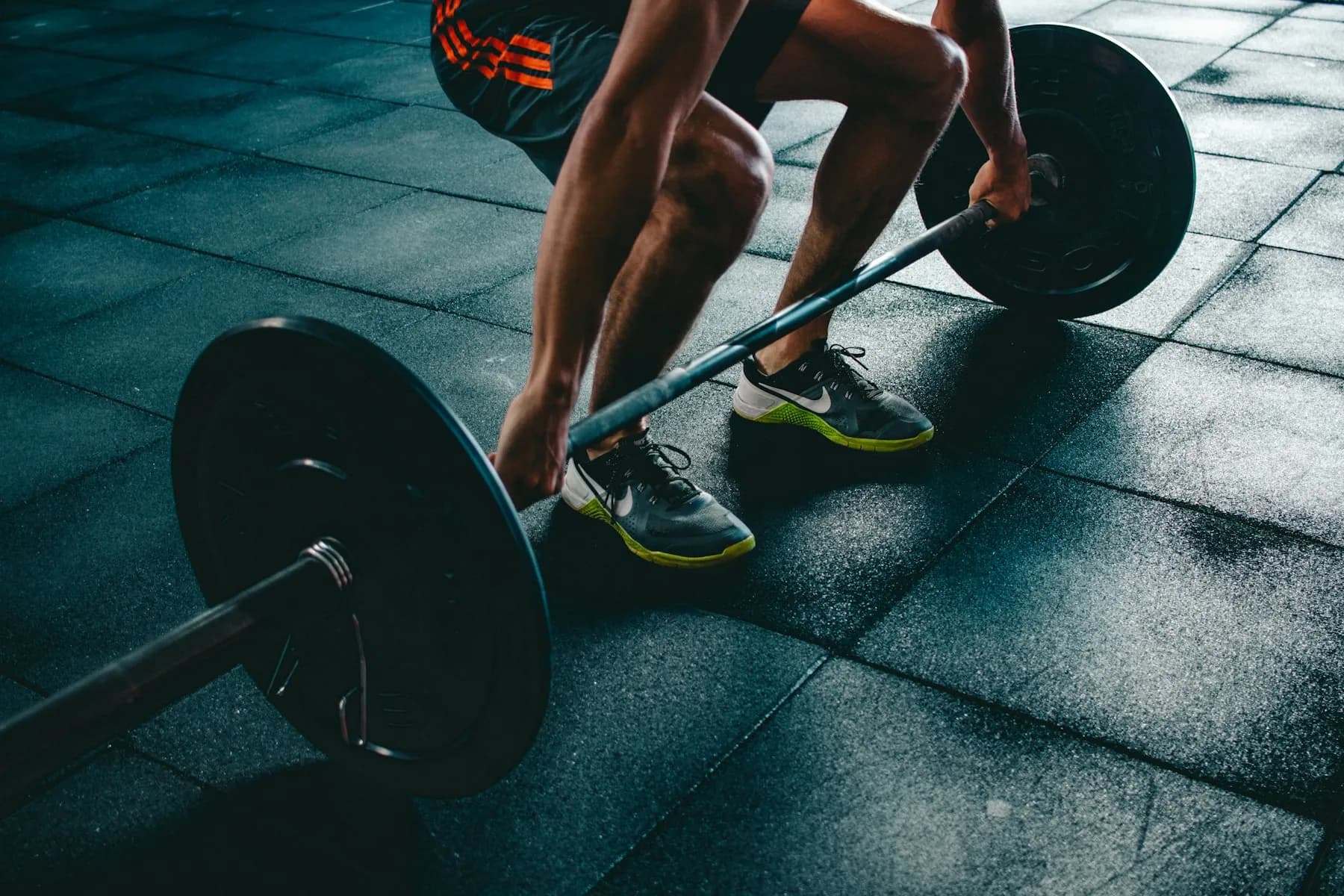 Strength training under gym lights