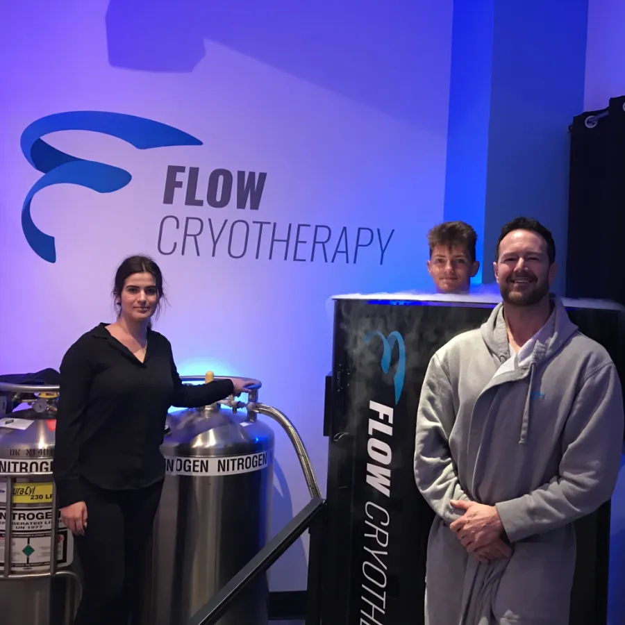 Jason Bookout with the Flow team inside the Flow Cryotherapy studio